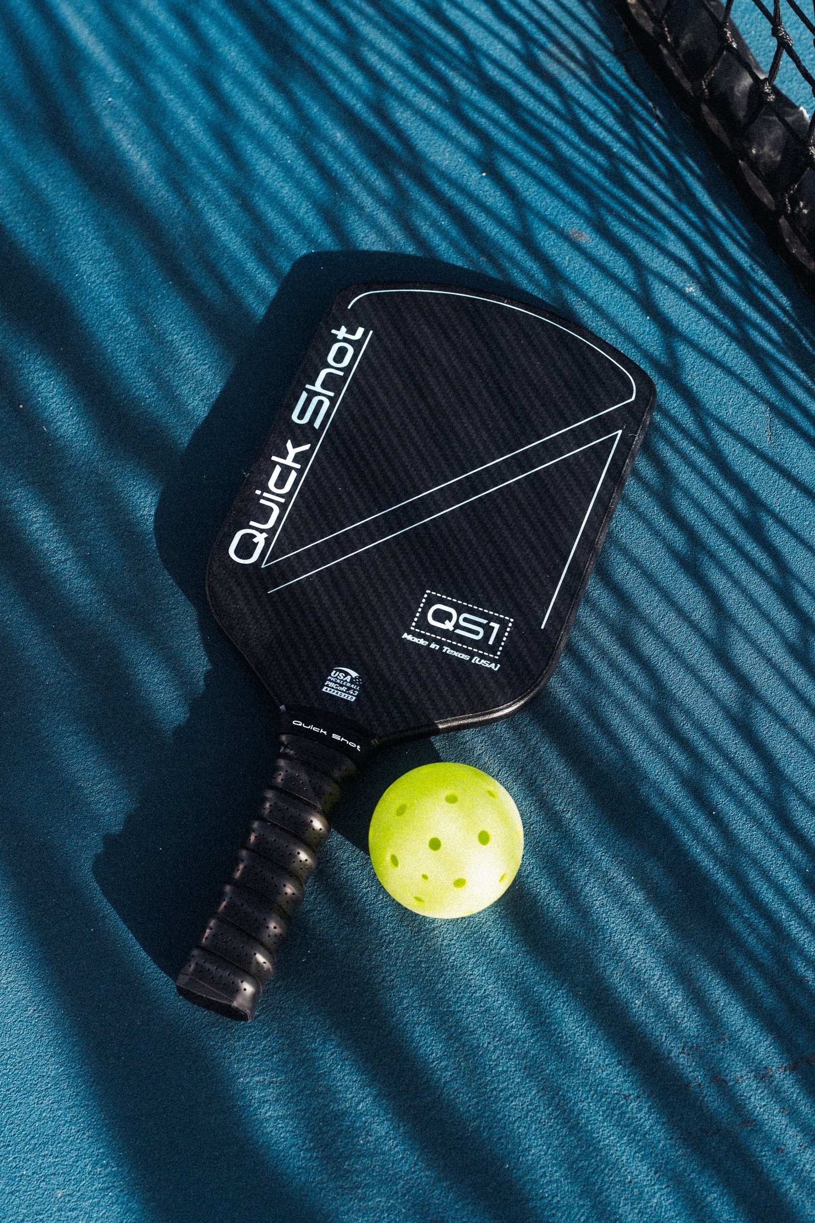 Quick Shot premium pickleball paddle closeup, manufactured in the US